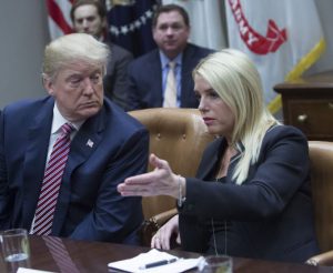 Pam Bondi while consulting with the United States president, Donald Trump