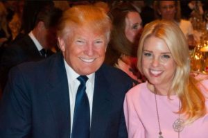 Pam Bondi with Donald Trump during a political event