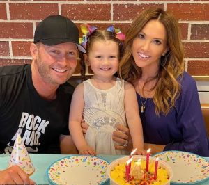 Kyly Clarke with her spouse, Michael while celebrating the fourth birthday of their daughter, Kelsey Lee
