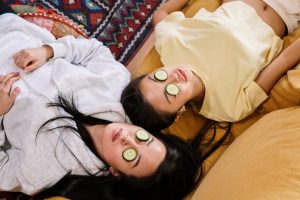 women sleeping with cucumber on their eyes